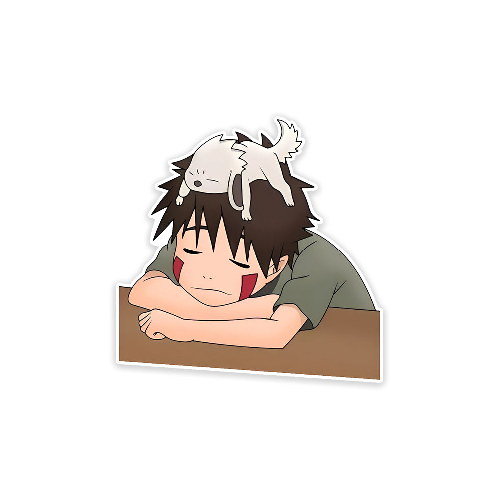 A rectangular sticker with a red background and a white horizontal stripe in the middle. In the center of the white stripe, black Devanagari text reads "घुमक्कड़" which translates to "Wanderer." The red background has faint travel-themed illustrations.