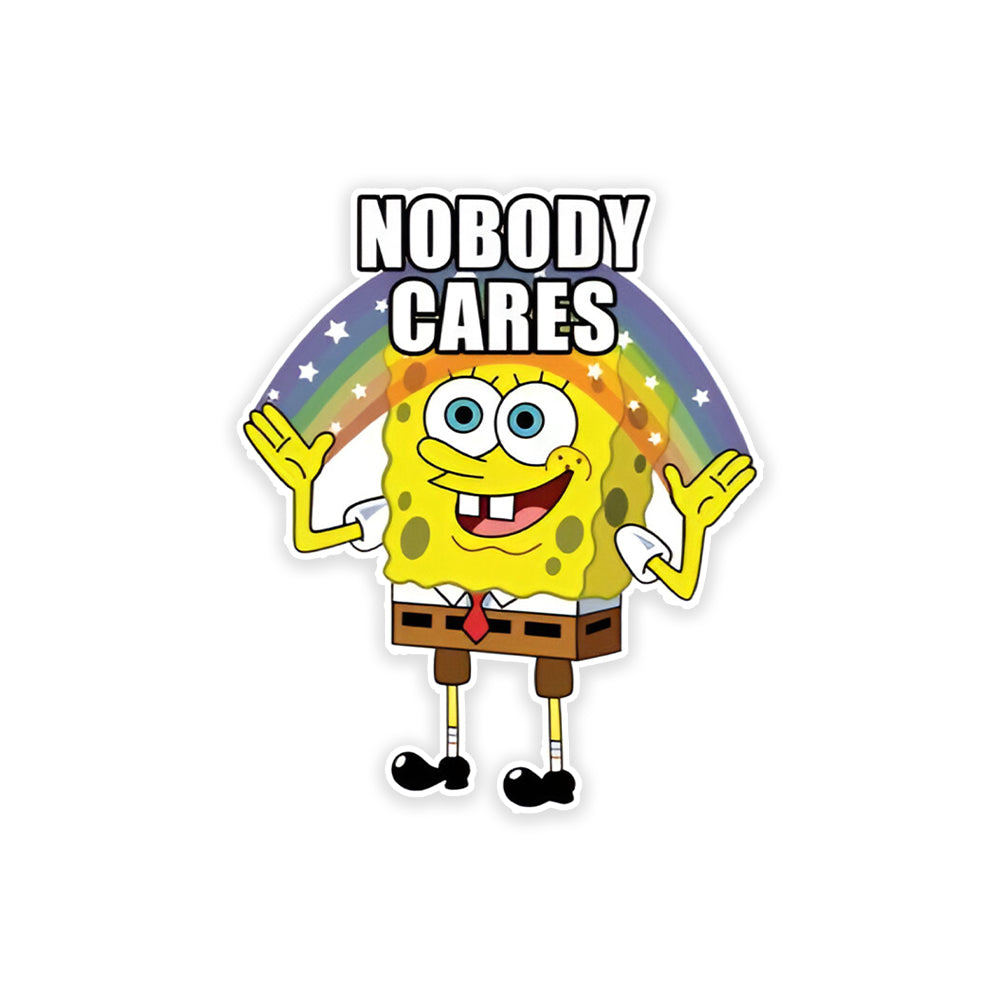 A rectangular sticker with a red background and a white horizontal stripe in the middle. In the center of the white stripe, black Devanagari text reads "घुमक्कड़" which translates to "Wanderer." The red background has faint travel-themed illustrations.