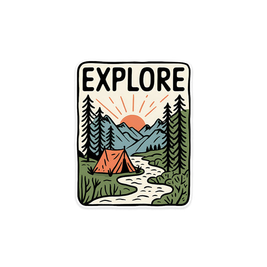 A rectangular sticker with a red background and a white horizontal stripe in the middle. In the center of the white stripe, black Devanagari text reads "घुमक्कड़" which translates to "Wanderer." The red background has faint travel-themed illustrations.