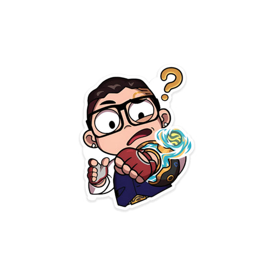 A rectangular sticker with a red background and a white horizontal stripe in the middle. In the center of the white stripe, black Devanagari text reads "घुमक्कड़" which translates to "Wanderer." The red background has faint travel-themed illustrations.