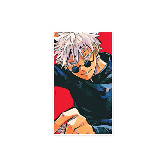A rectangular sticker with a red background and a white horizontal stripe in the middle. In the center of the white stripe, black Devanagari text reads "घुमक्कड़" which translates to "Wanderer." The red background has faint travel-themed illustrations.