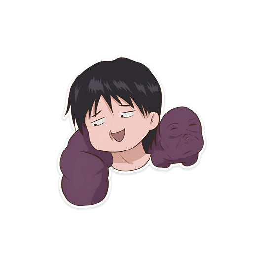 A rectangular sticker with a red background and a white horizontal stripe in the middle. In the center of the white stripe, black Devanagari text reads "घुमक्कड़" which translates to "Wanderer." The red background has faint travel-themed illustrations.